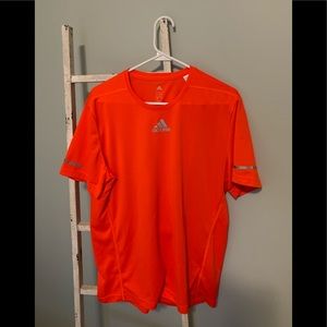 Men’s Adidas orange climalite shirt.